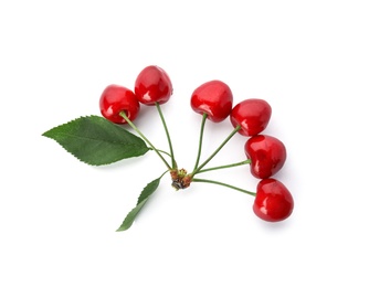 Sweet red cherries with leaves on white background