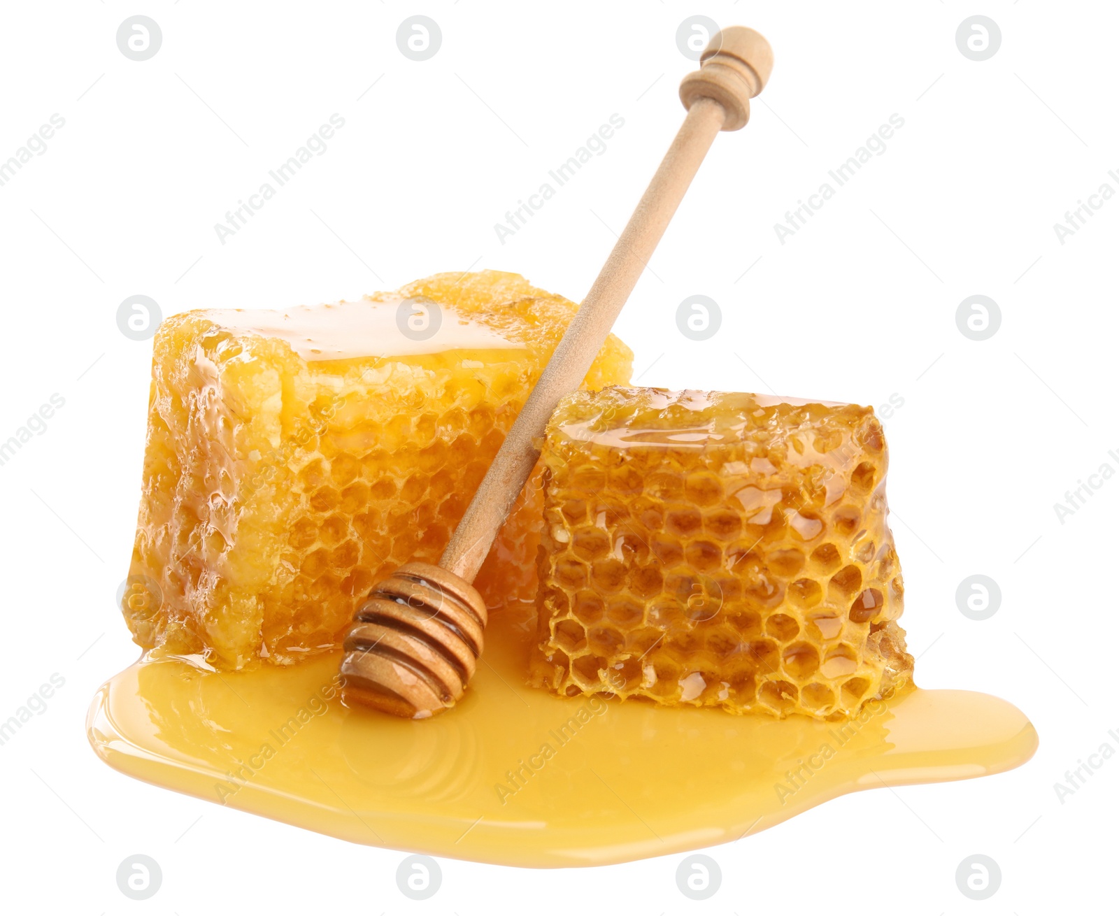 Photo of Fresh honeycombs and dipper isolated on white