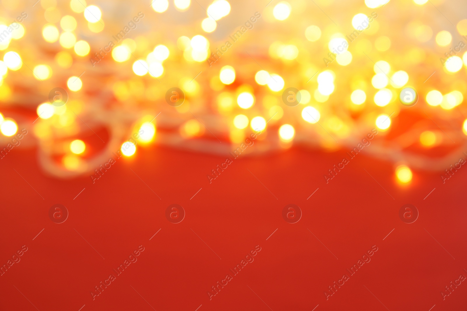 Photo of Blurred view of beautiful Christmas lights. Festive background