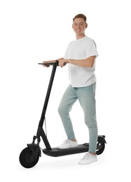 Happy man with modern electric kick scooter on white background
