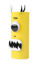 Photo of Monster made of yellow paper isolated on white. Halloween decoration