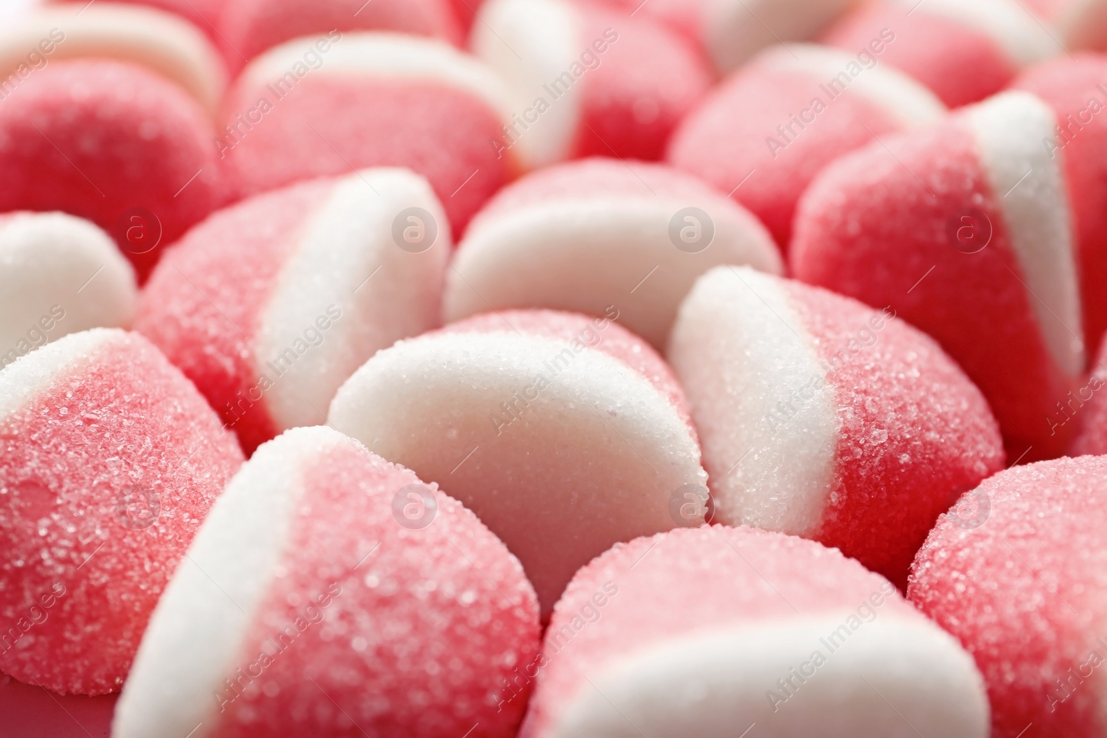 Photo of Closeup of sweet color jelly candies as background