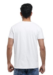 Man in t-shirt on white background, back view