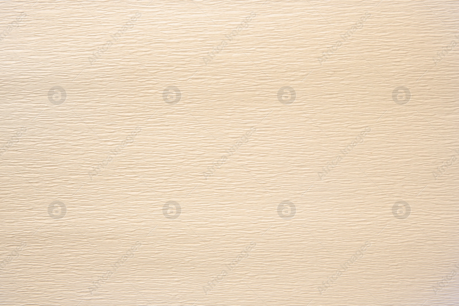 Photo of Texture of beige paper sheet as background, closeup