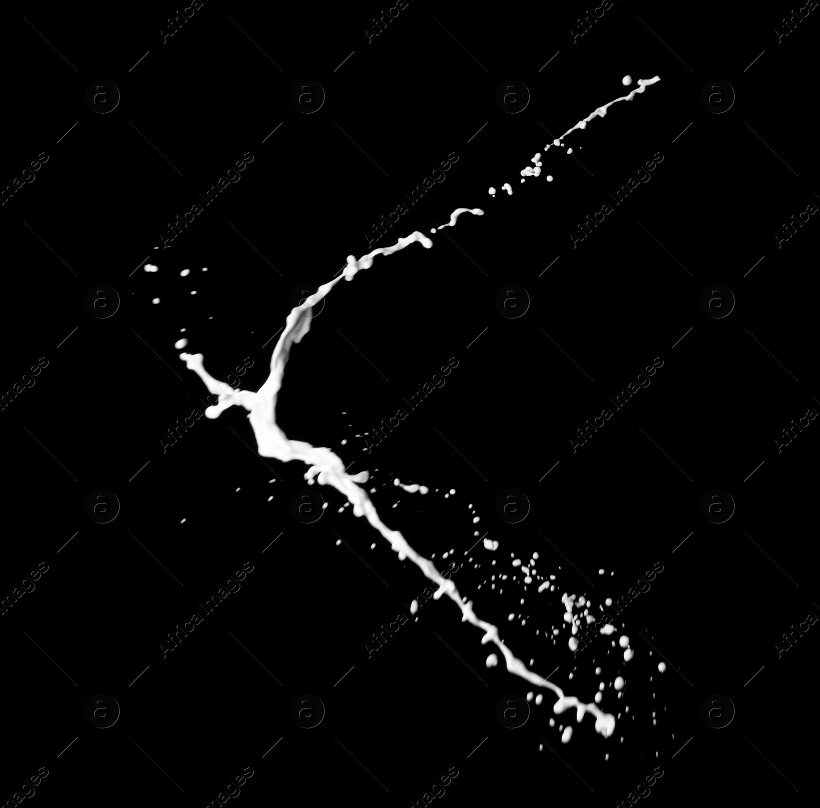 Photo of Splash of fresh milk on black background