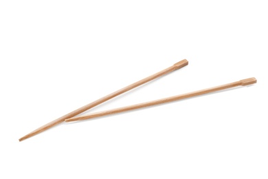 Chopsticks made of bamboo on white background