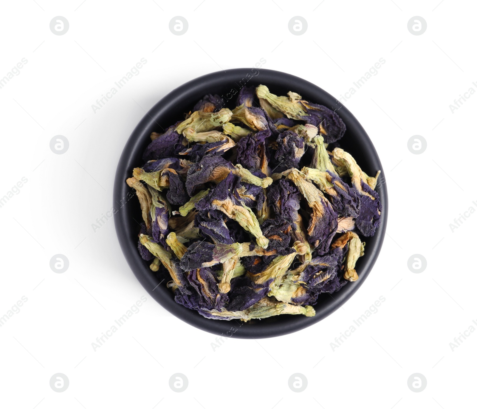 Photo of Organic blue Anchan in bowl on white background, top view. Herbal tea