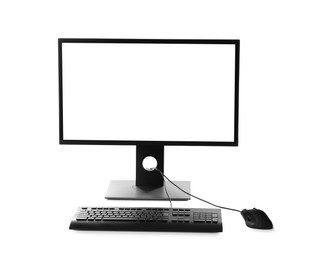 Photo of Modern computer with blank monitor screen and peripherals on white background