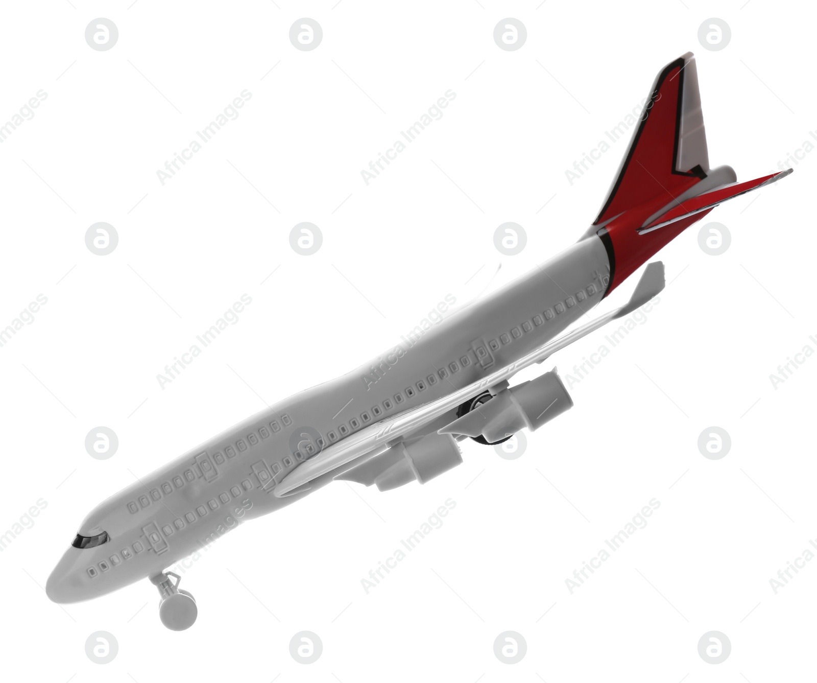 Photo of Toy airplane isolated on white. Travel concept