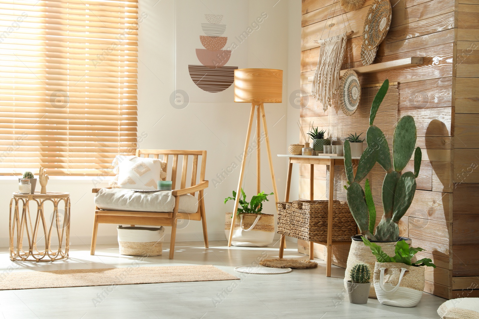 Photo of Stylish living room interior with comfortable wooden armchair and beautiful houseplants
