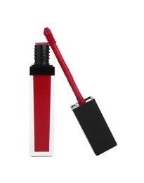 Photo of Red lip gloss and applicator isolated on white. Cosmetic product