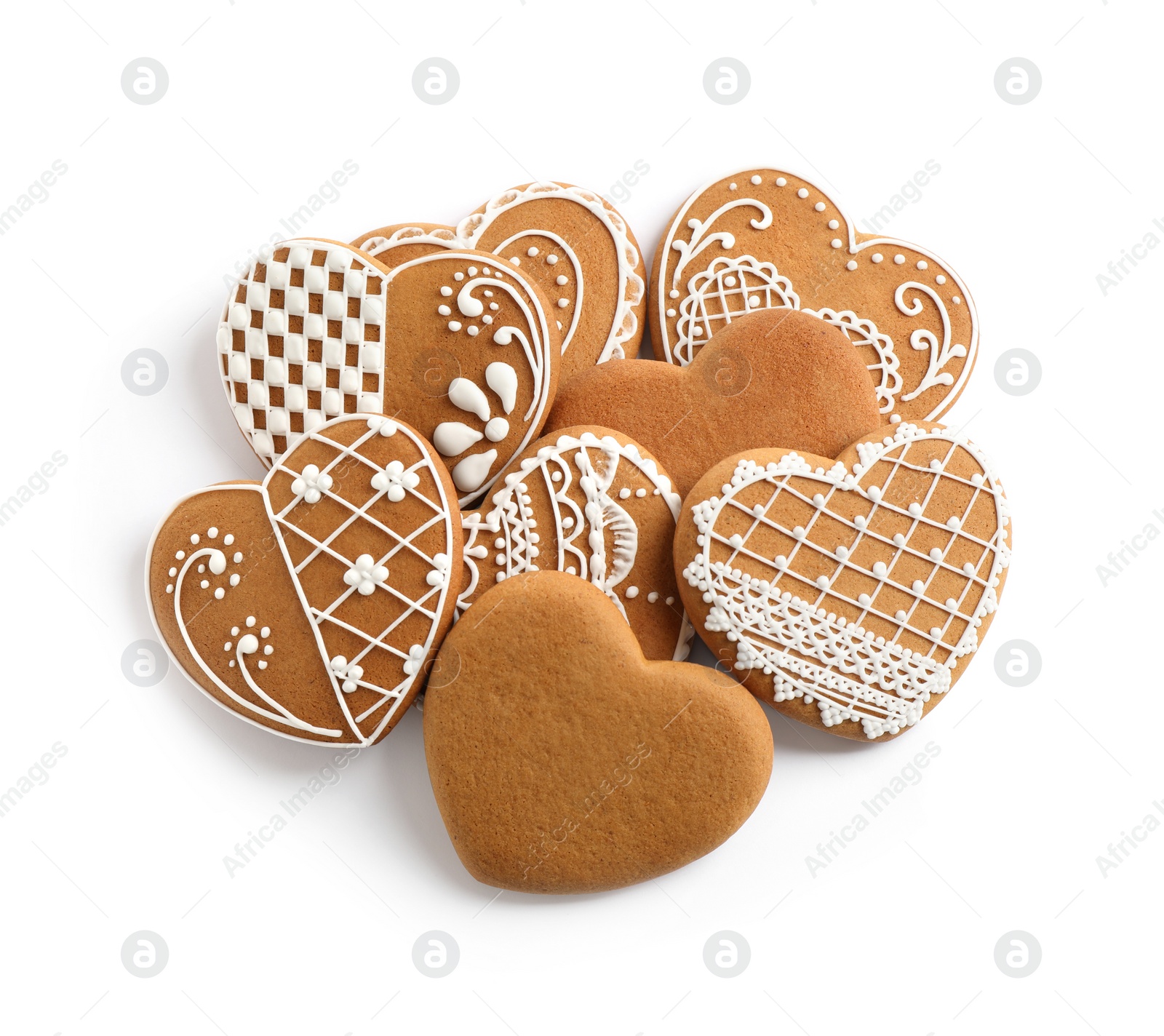 Photo of Tasty heart shaped gingerbread cookies isolated on white, top view