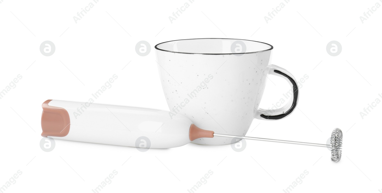 Photo of Milk frother wand and cup isolated on white