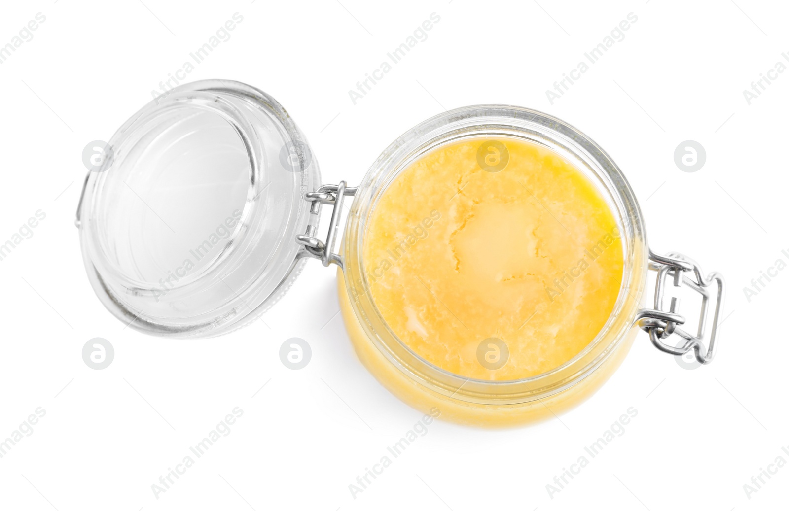 Photo of Glass jar of Ghee butter isolated on white, top view