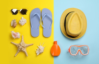 Photo of Flat lay composition with beach objects on color background