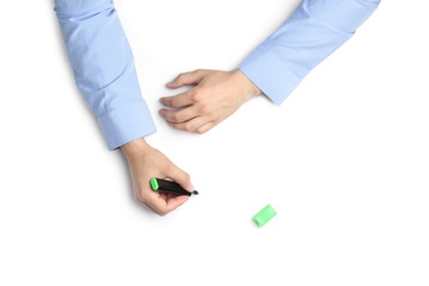 Photo of Man with highlighter on white background, top view. Closeup of hands