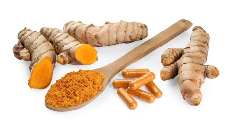 Photo of Aromatic turmeric powder, pills and raw roots isolated on white