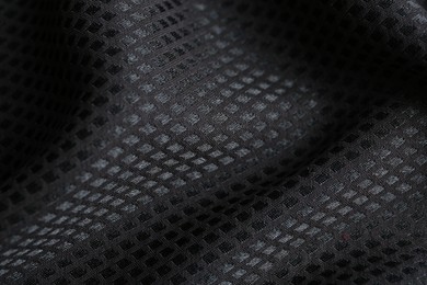 Textured black fabric as background, closeup view