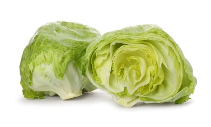 Whole and cut fresh green iceberg lettuces isolated on white