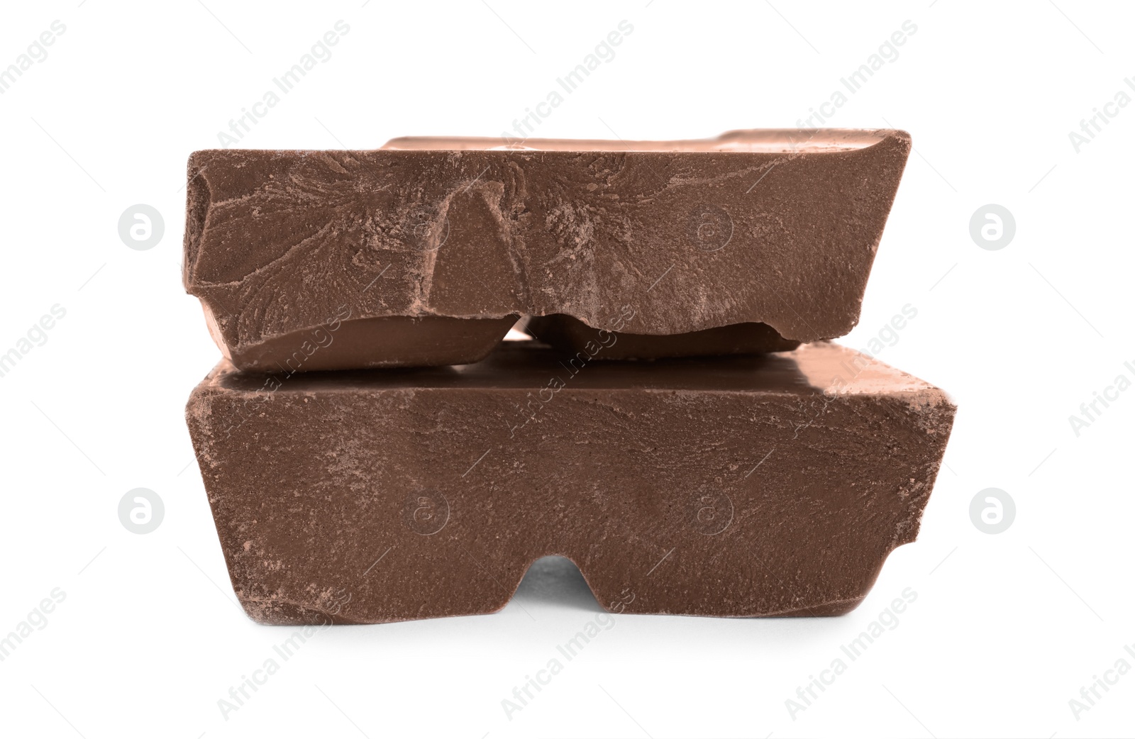 Photo of Pieces of milk chocolate isolated on white