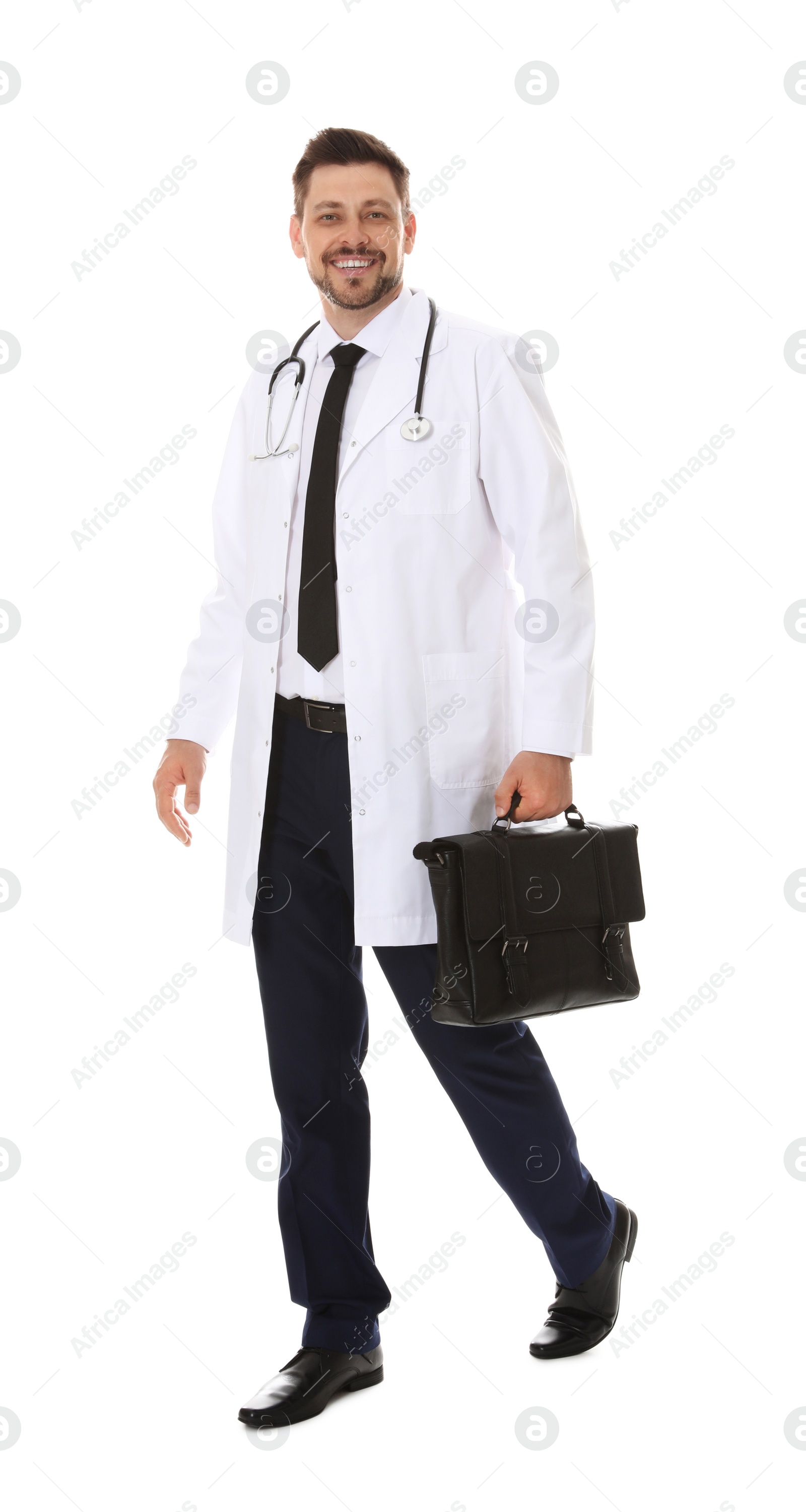 Photo of Full length portrait of male doctor with briefcase isolated on white. Medical staff