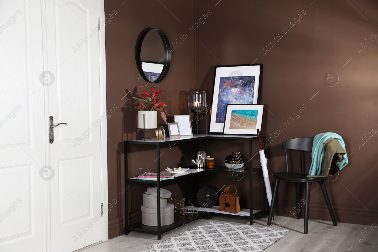 Photo of Hallway interior with console table and stylish decor