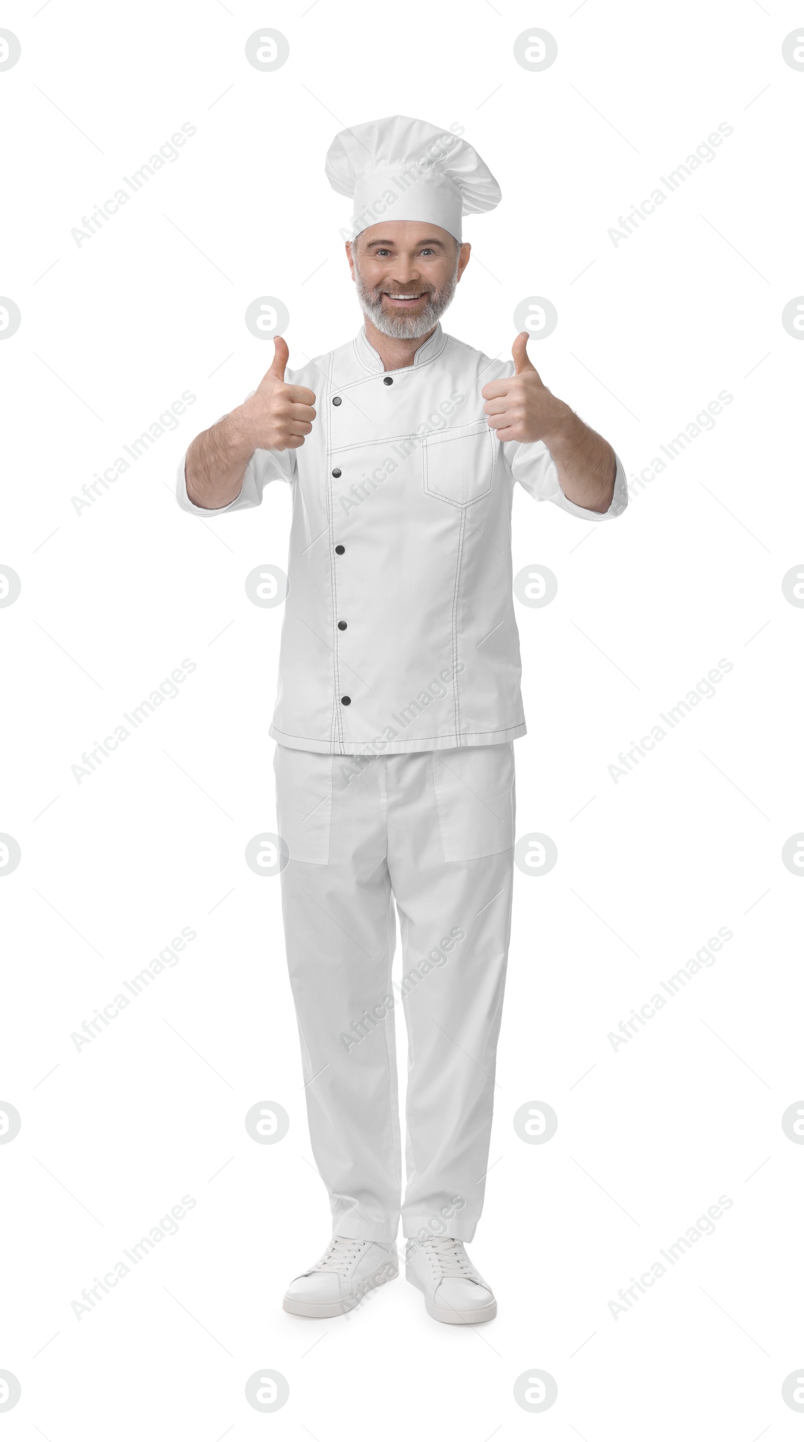 Photo of Happy chef in uniform showing thumbs up on white background