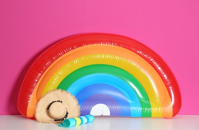 Photo of Beach objects near color wall. Summer vacation