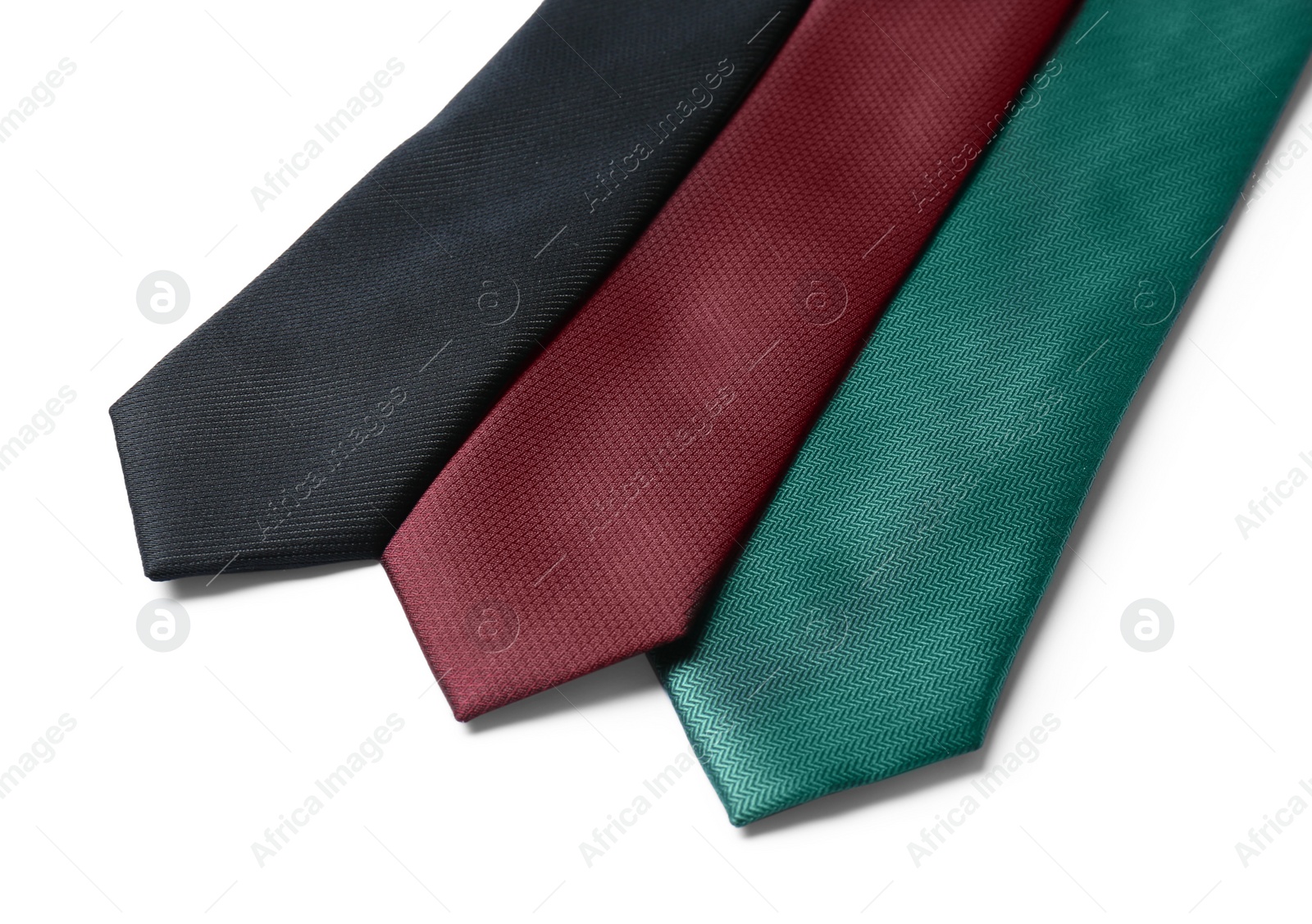 Photo of Group of colorful neckties isolated on white