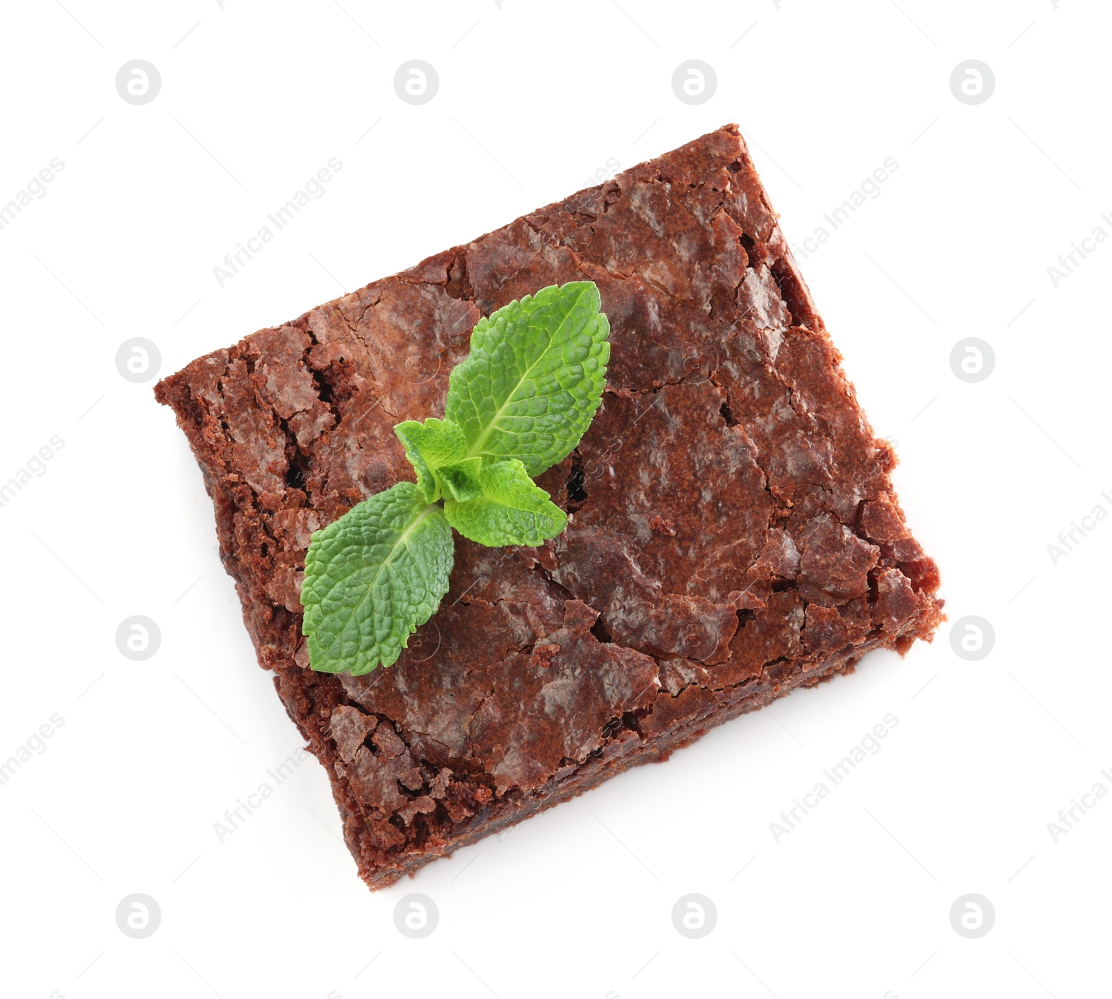 Photo of Delicious chocolate brownie with fresh mint leaves on white background, top view