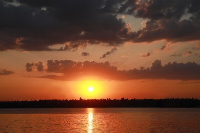 Picturesque view of beautiful sunset on riverside