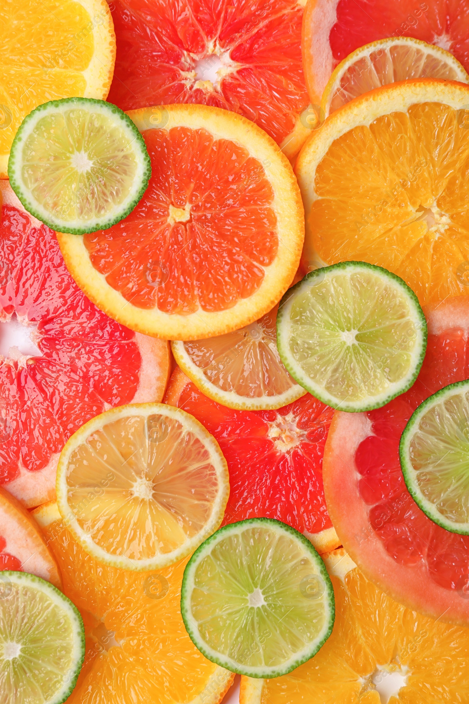 Photo of Many fresh yummy citrus slices