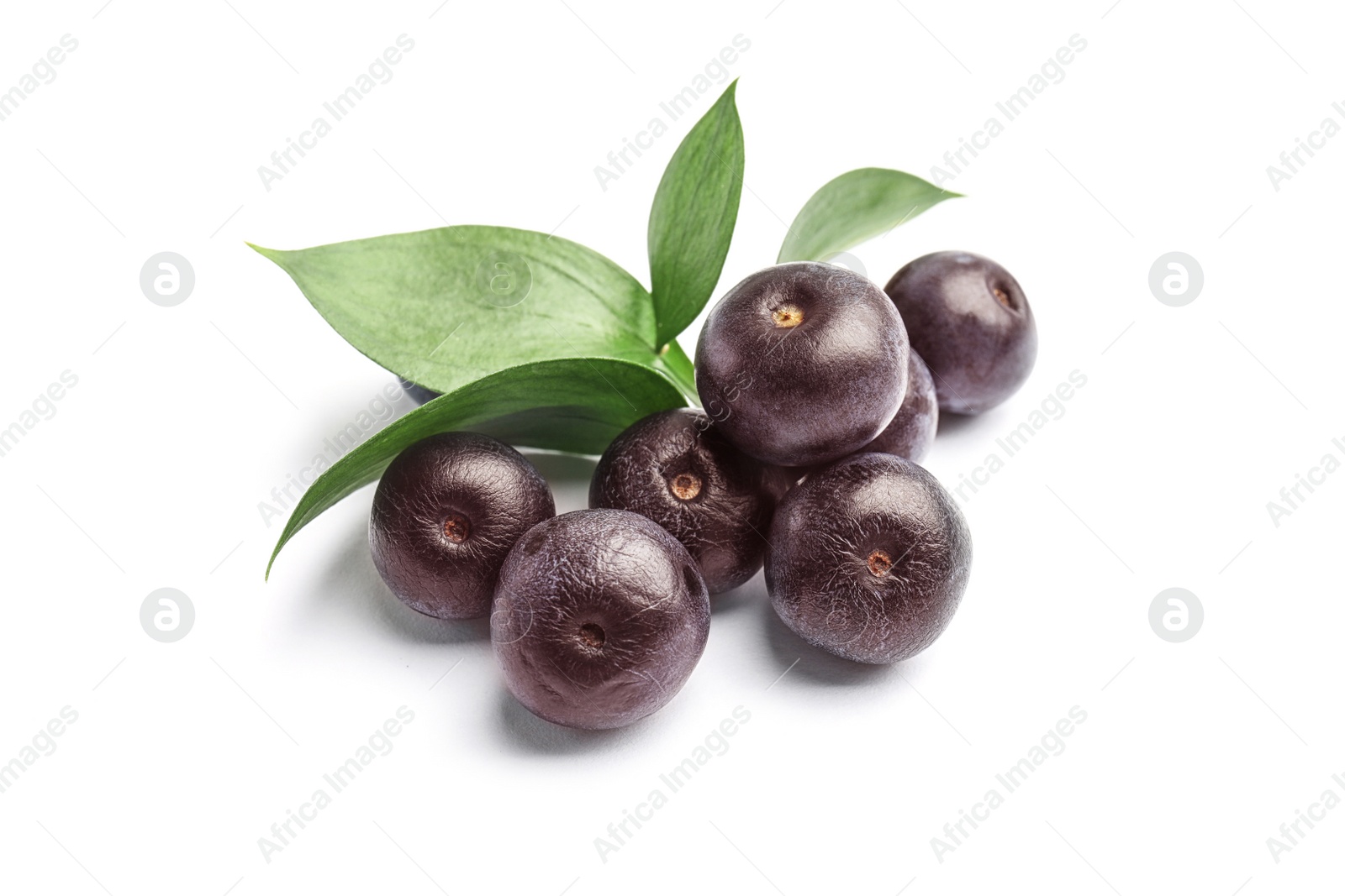 Photo of Fresh acai berries with leaves on white background