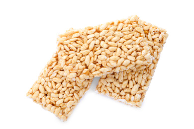 Photo of Delicious rice crispy treats isolated on white, top view