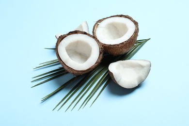 Photo of Ripe coconut on color background