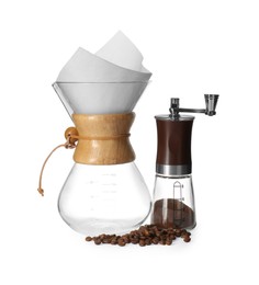 Photo of Empty glass chemex coffeemaker, grinder and beans isolated on white