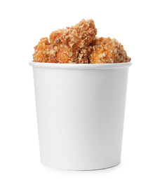 Photo of Bucket with yummy fried nuggets isolated on white