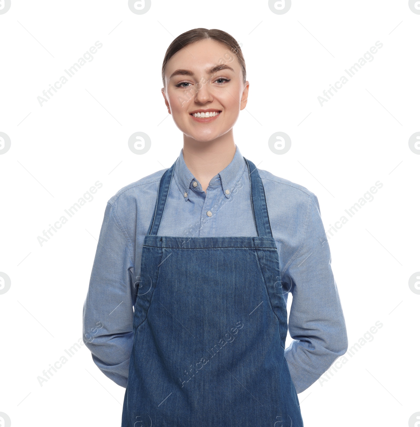 Photo of Beautiful young woman in clean denim apron on white background