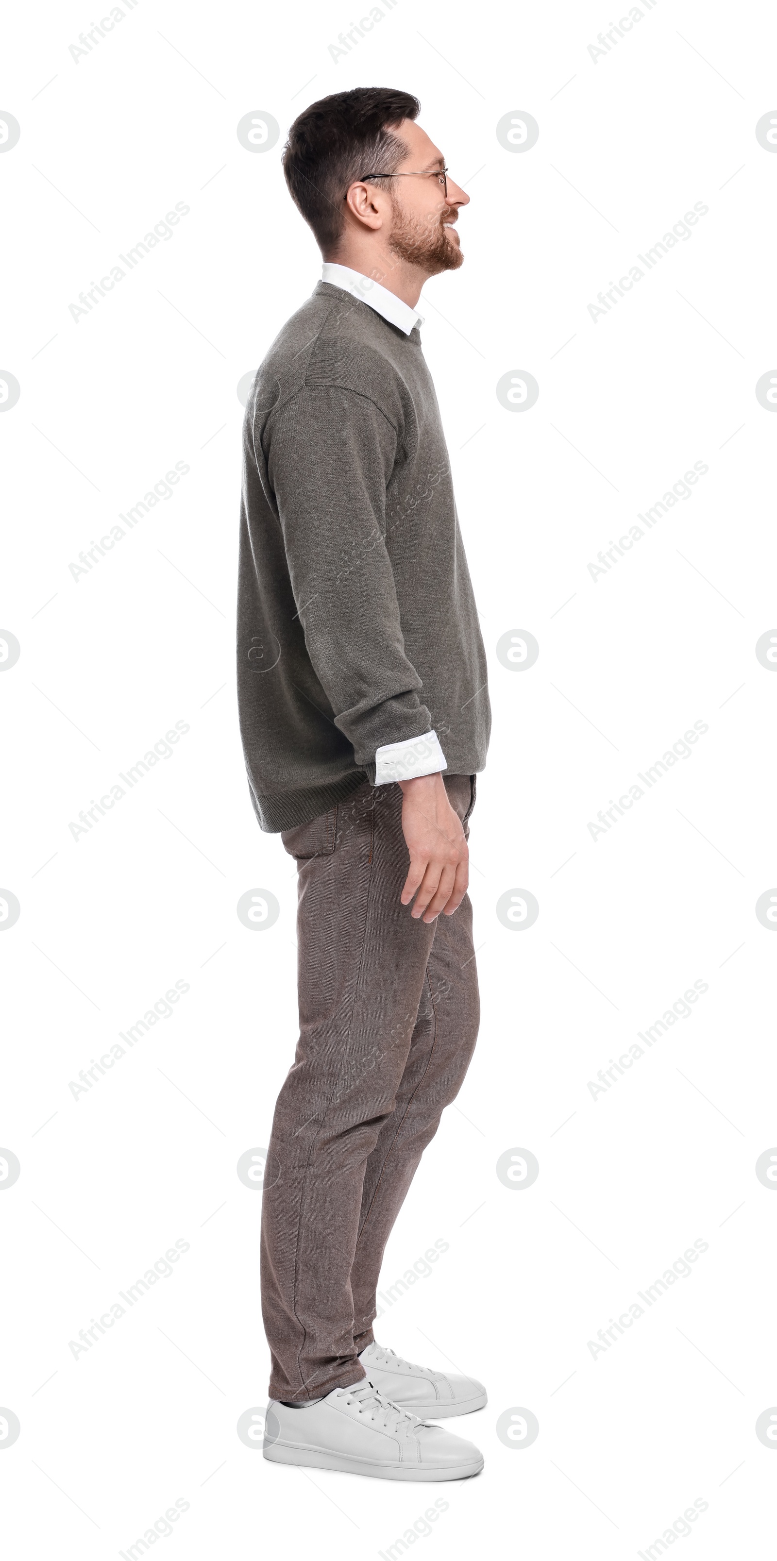 Photo of Handsome bearded businessman in eyeglasses on white background