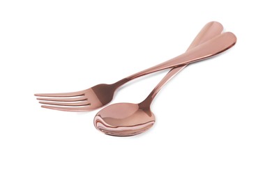 Photo of New shiny fork and spoon on white background