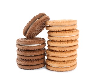 Photo of Different tasty sandwich cookies on white background