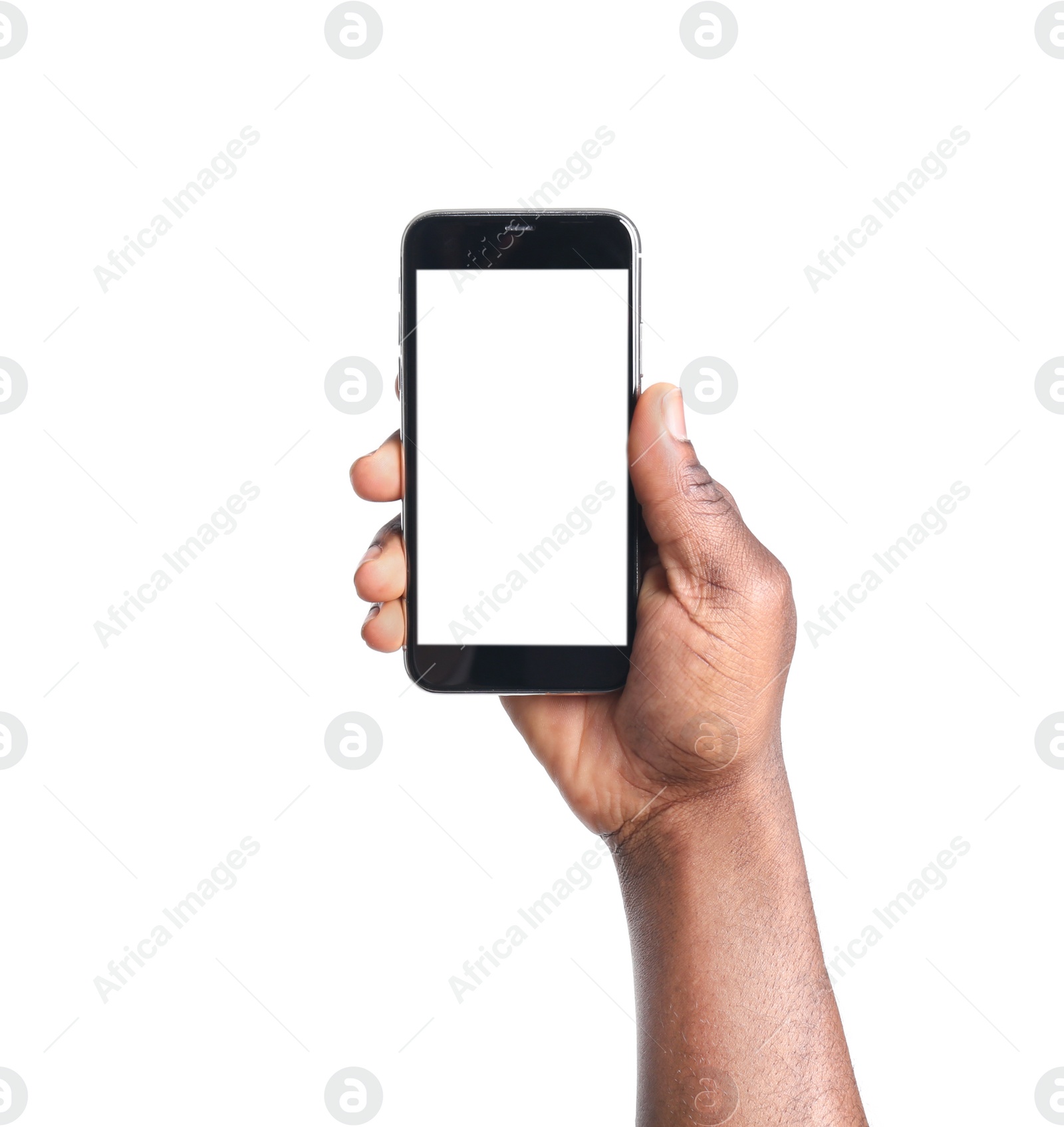 Photo of African-American man holding mobile phone with blank screen in hand on white background