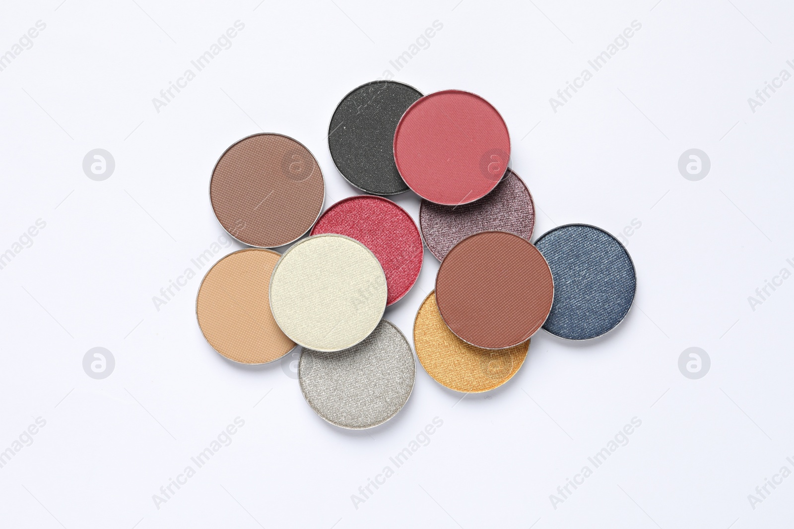 Photo of Different beautiful eye shadows on white background, flat lay