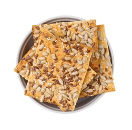 Photo of Cereal crackers with flax, sunflower and sesame seeds in bowl isolated on white, top view