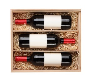 Wooden gift box with wine bottles isolated on white, top view