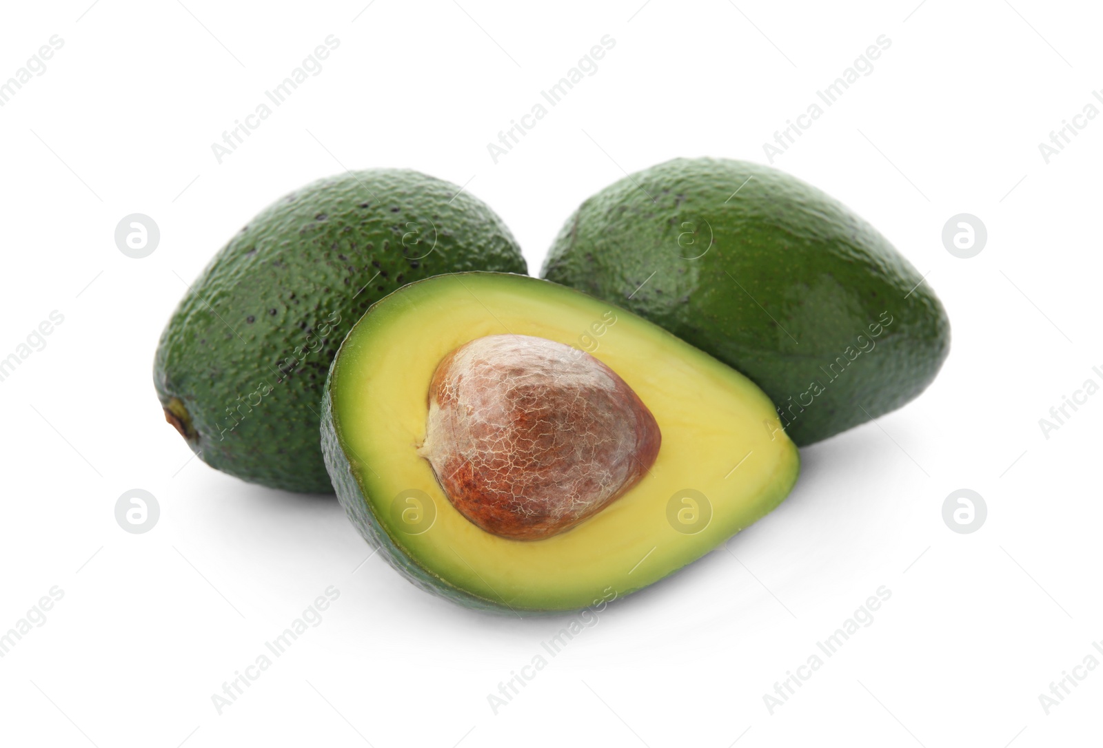 Photo of Ripe avocados on white background. Tropical fruit