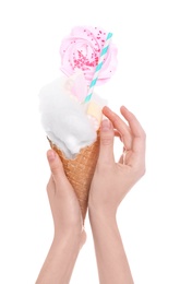 Young woman holding tasty dessert on white background, closeup view of hands