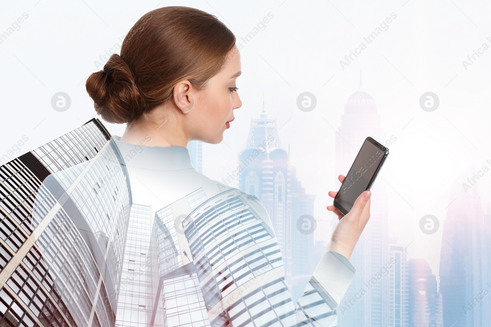 Image of Double exposure of businesswoman with phone and city landscape
