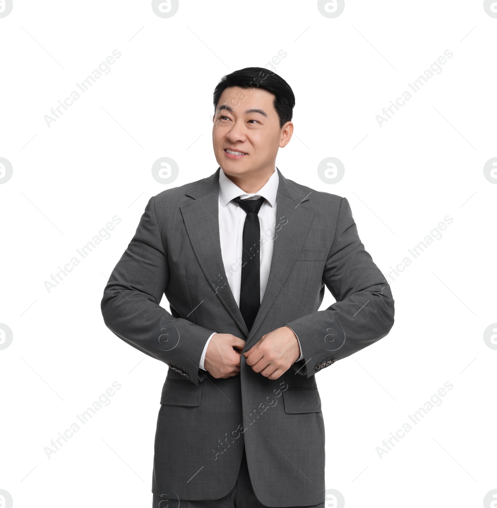 Photo of Businessman in suit posing on white background