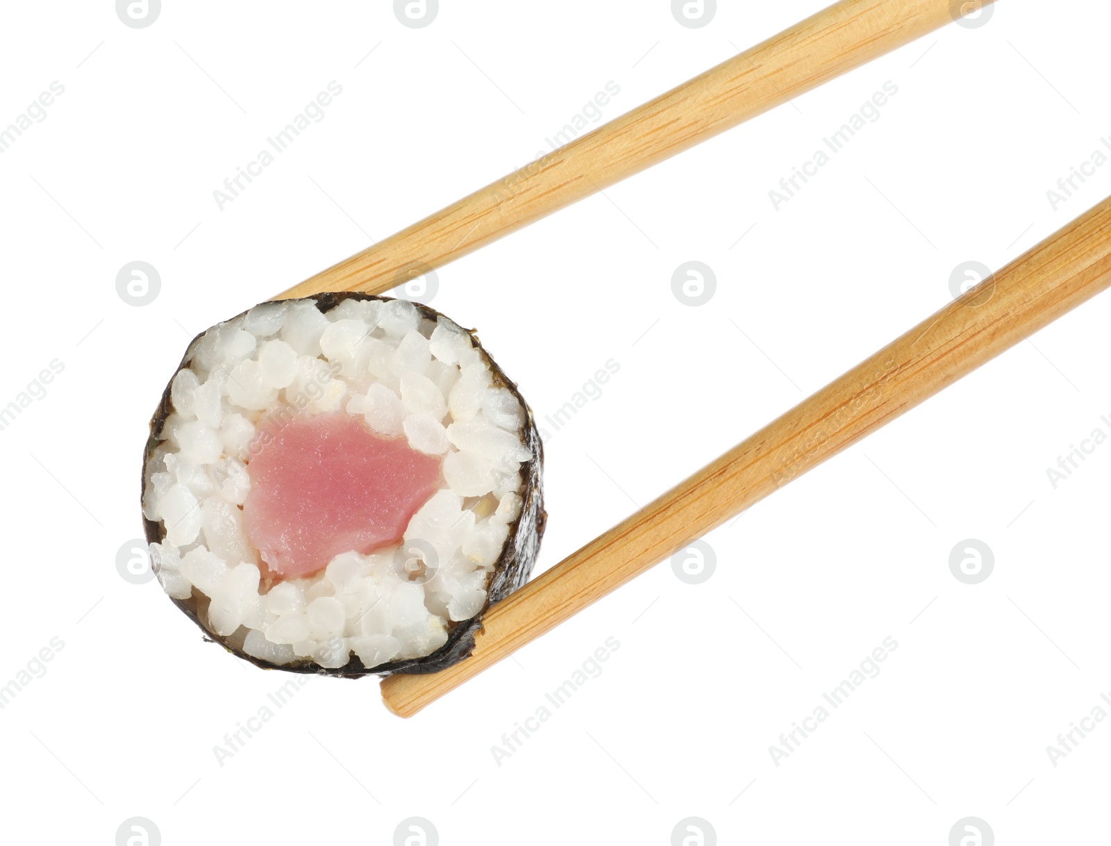 Photo of Chopsticks with tasty fresh sushi roll isolated on white